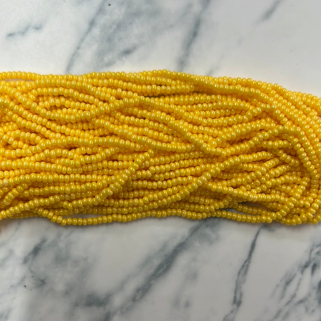 Chaquirita amarillo esmaltado