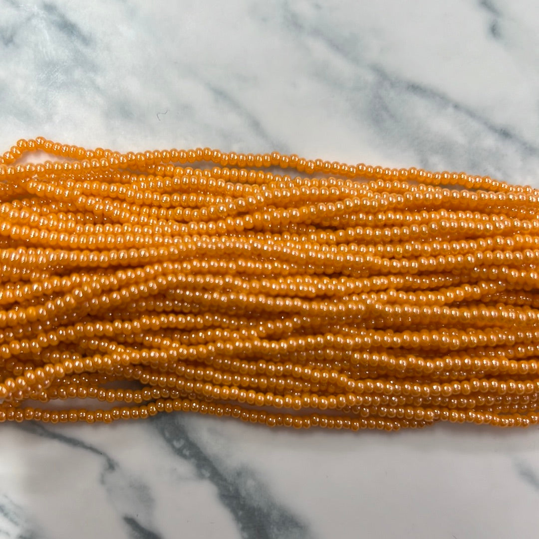 Chaquirita naranja brillante