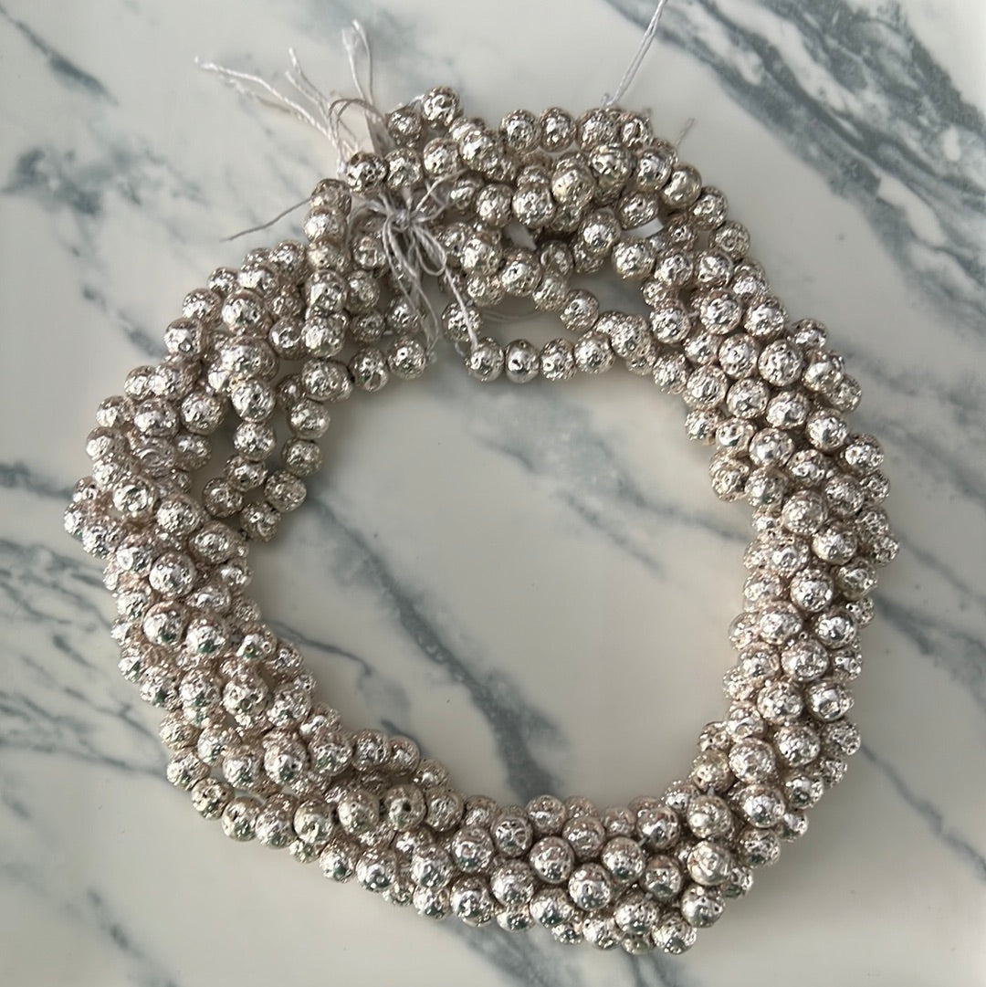 Ematita volcánica plata