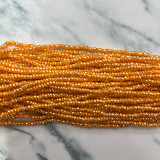 Chaquirita naranja brillante