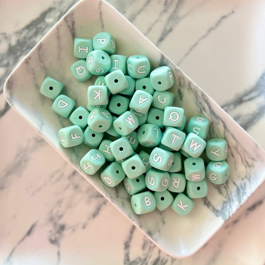Letra bebé verde